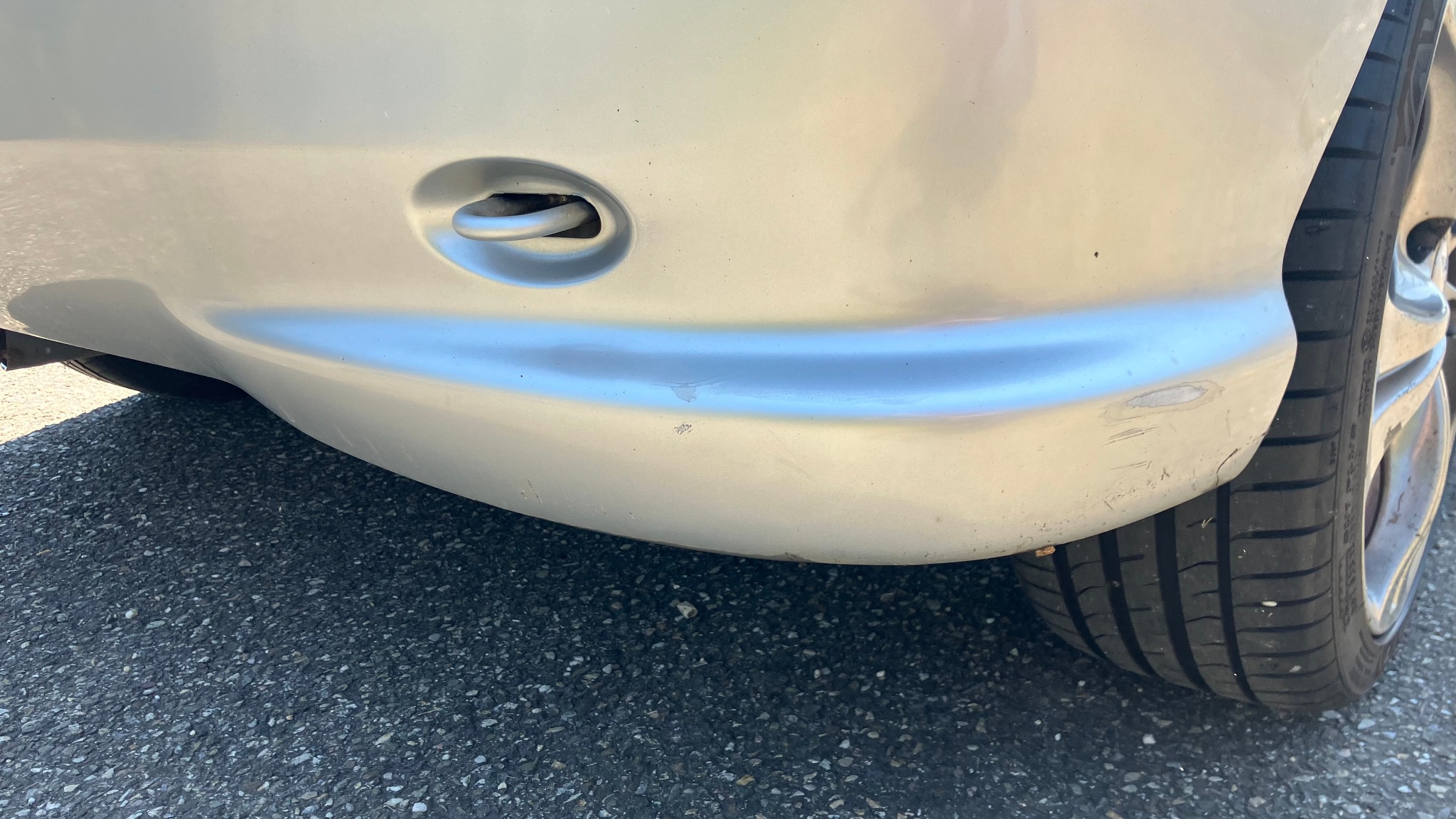 206 CC 2006 - Défaut peinture pare-choc arrière côté droit