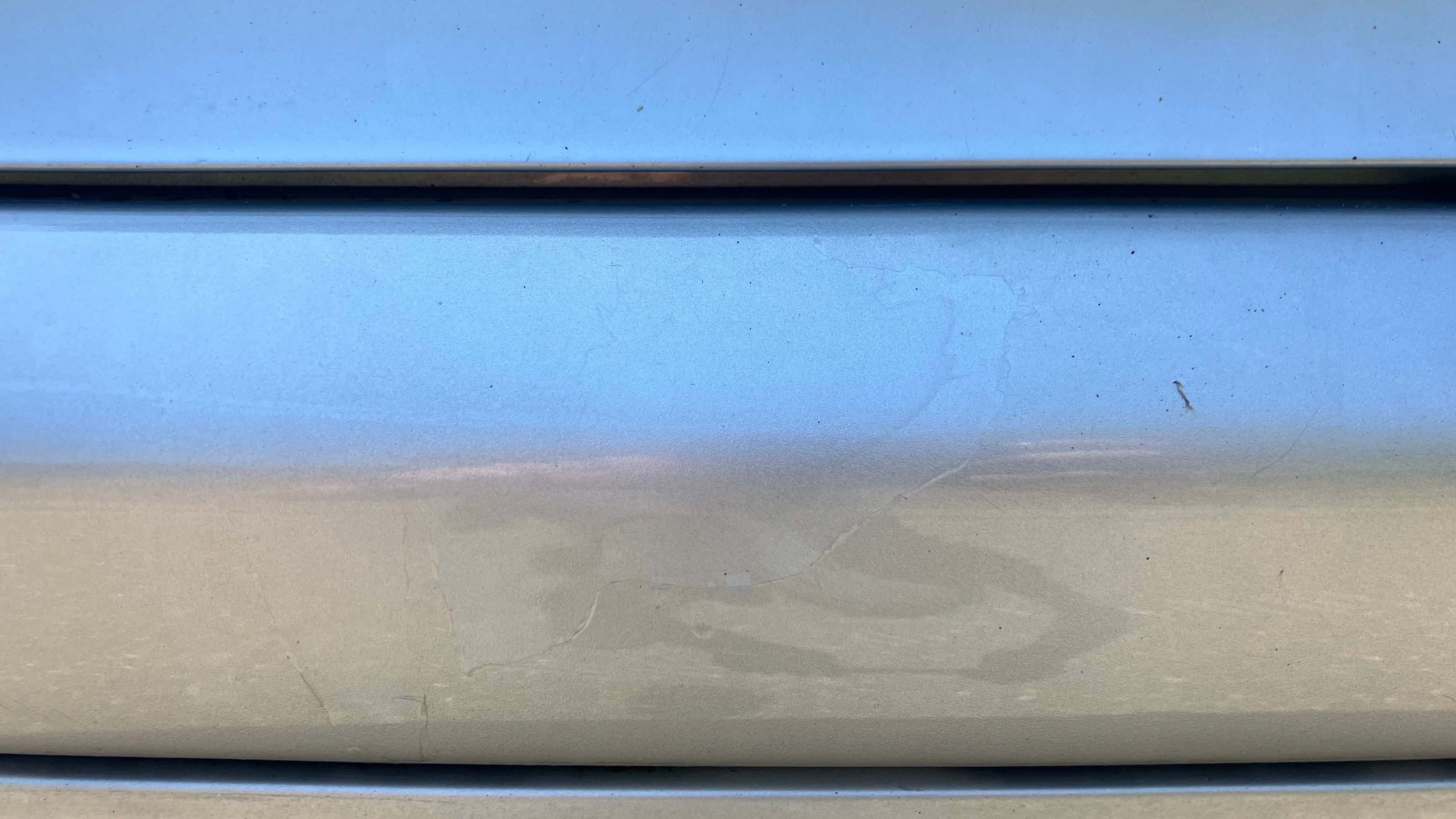 206 CC 2006 - Défaut vernis pare-choc arrière