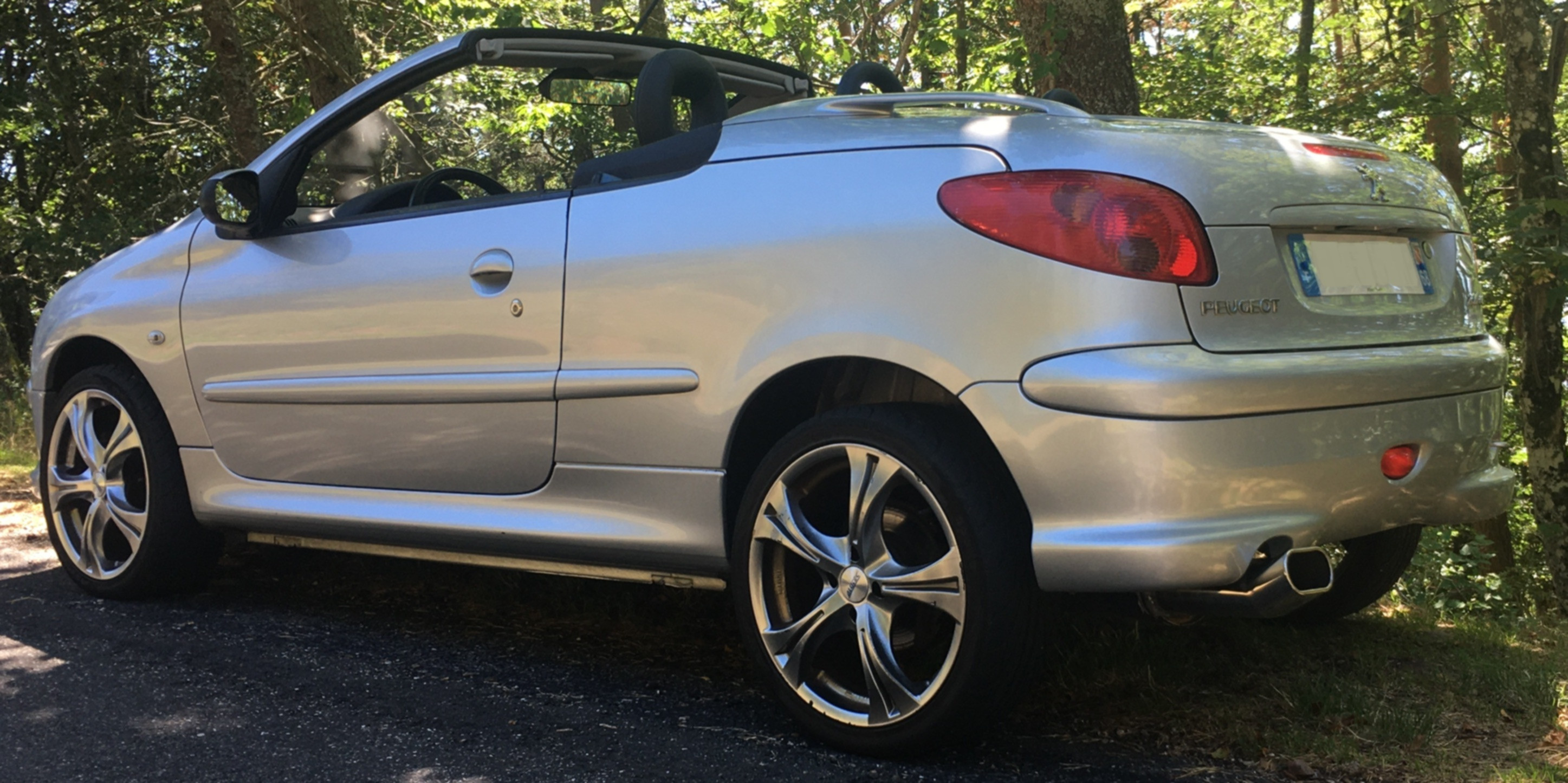 206 CC 2006 - Toit ouvert vue 3/4 gauche arrière